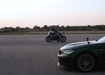 BMW M1000 RR vs BMW M5 CS Intense Drag Race (video)